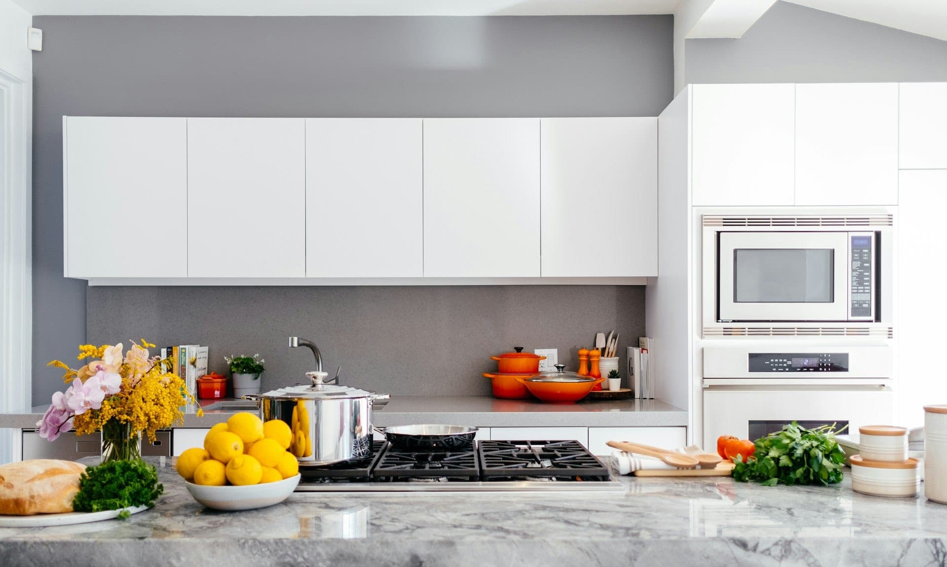 A clean modern kitchen with built-in appliances.